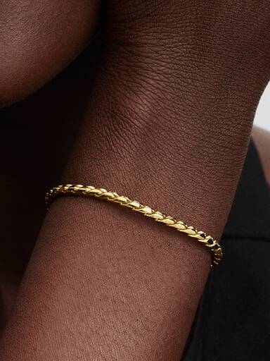Brazalete de cadena trenzada con broche redondo
