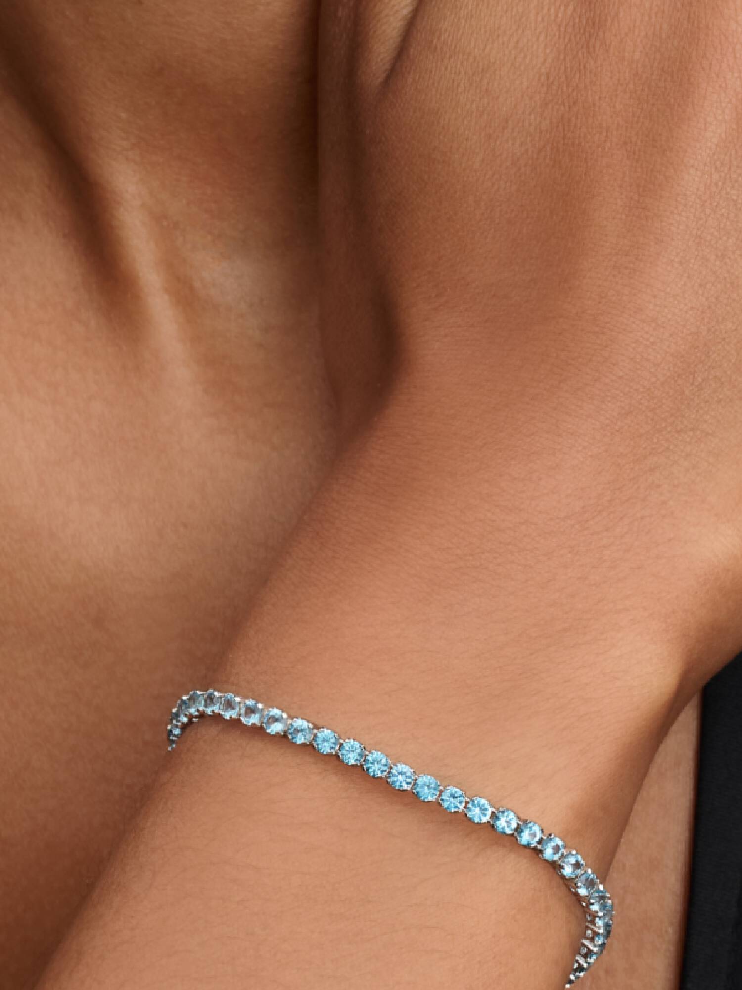 Brazalete de tenis azul claro reluciente