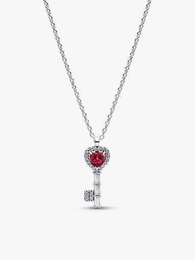 Conjunto de collar y pendientes con llave de corazón elevada