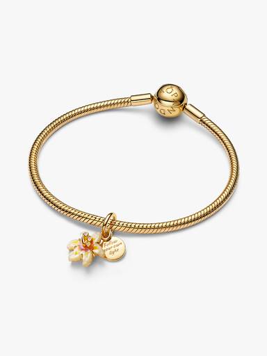 Charm Flor de gota de sol enredada que brilla en la oscuridad de Disney