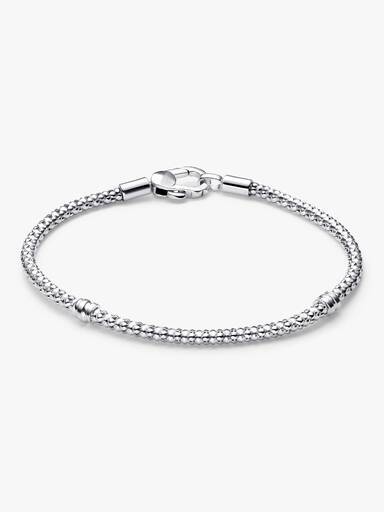 Brazalete de cadena y broche de botón