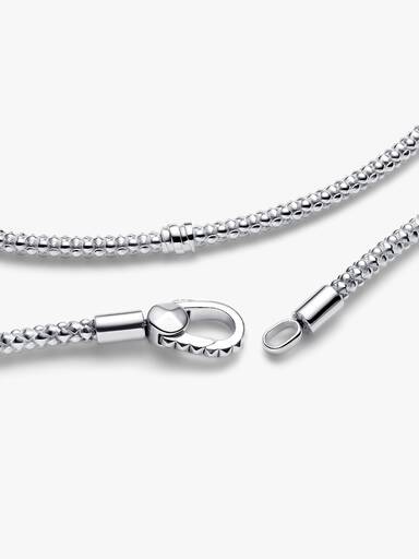Brazalete de cadena y broche de botón