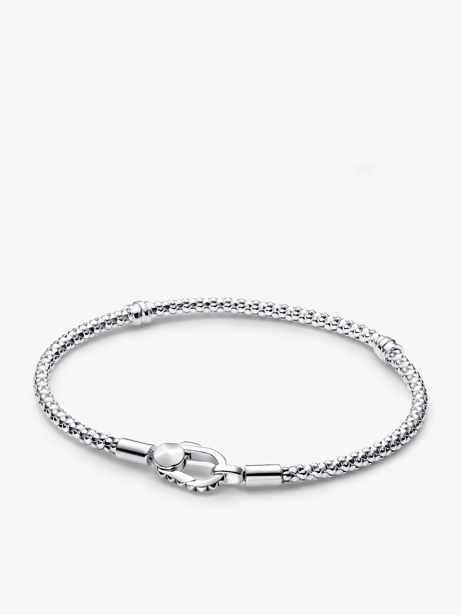 Brazalete de cadena y broche de botón